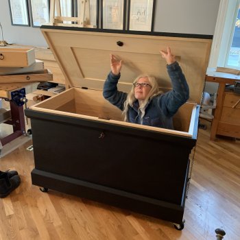 Fitzpatrick inside a custom oversize tool chest she built for a client, 25 x 52 x 28 in. Photo by Christopher Schwarz.