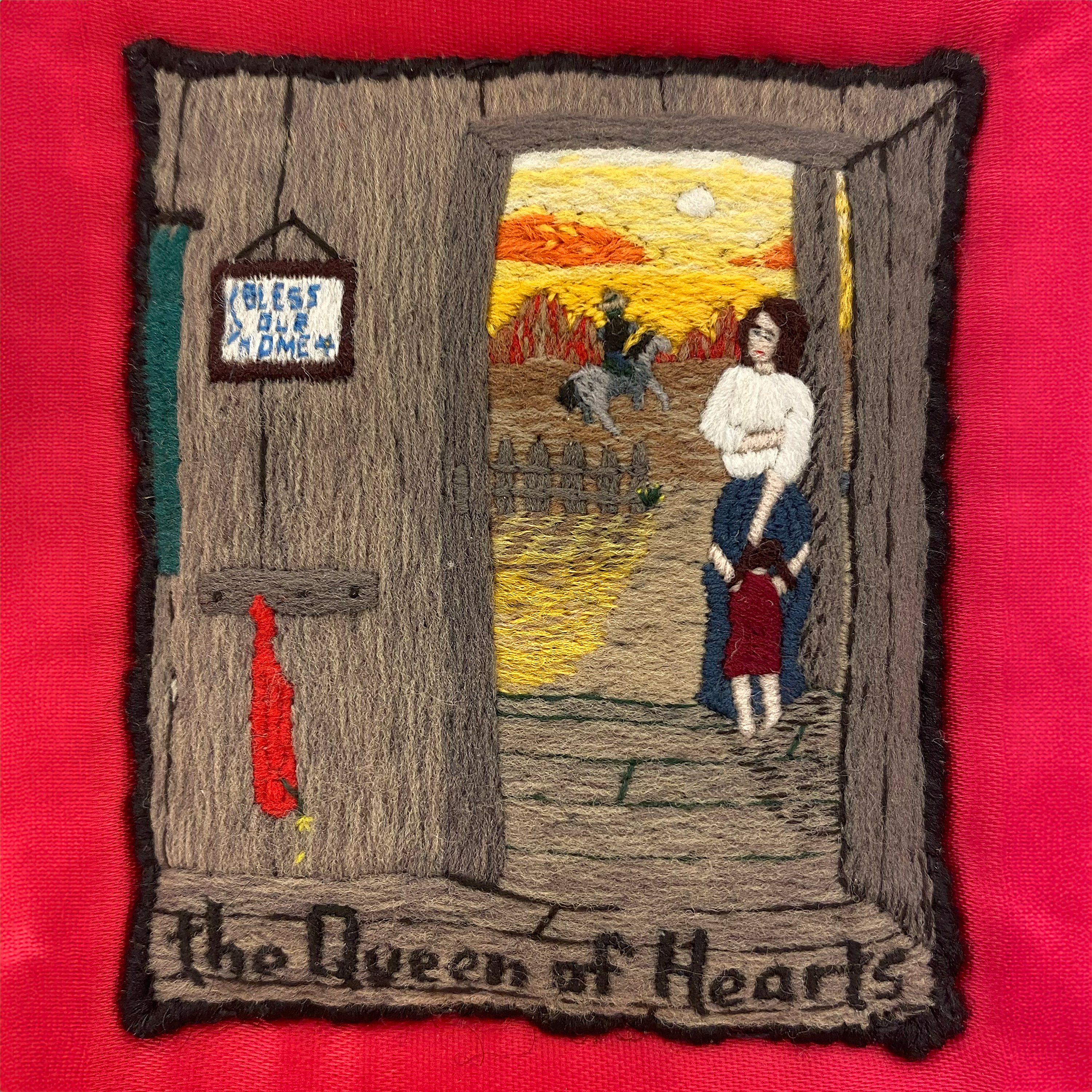 Ray Materson embroidered Queen of Hearts in a Connecticut prison using thread from unraveled socks, silk, and fiber. It will appear in Between the Lines: Prison Art and Advocacy at the Museum of International Folk Art. 3.75 x 5.5 in. Photo by Chloe Accardi. 
