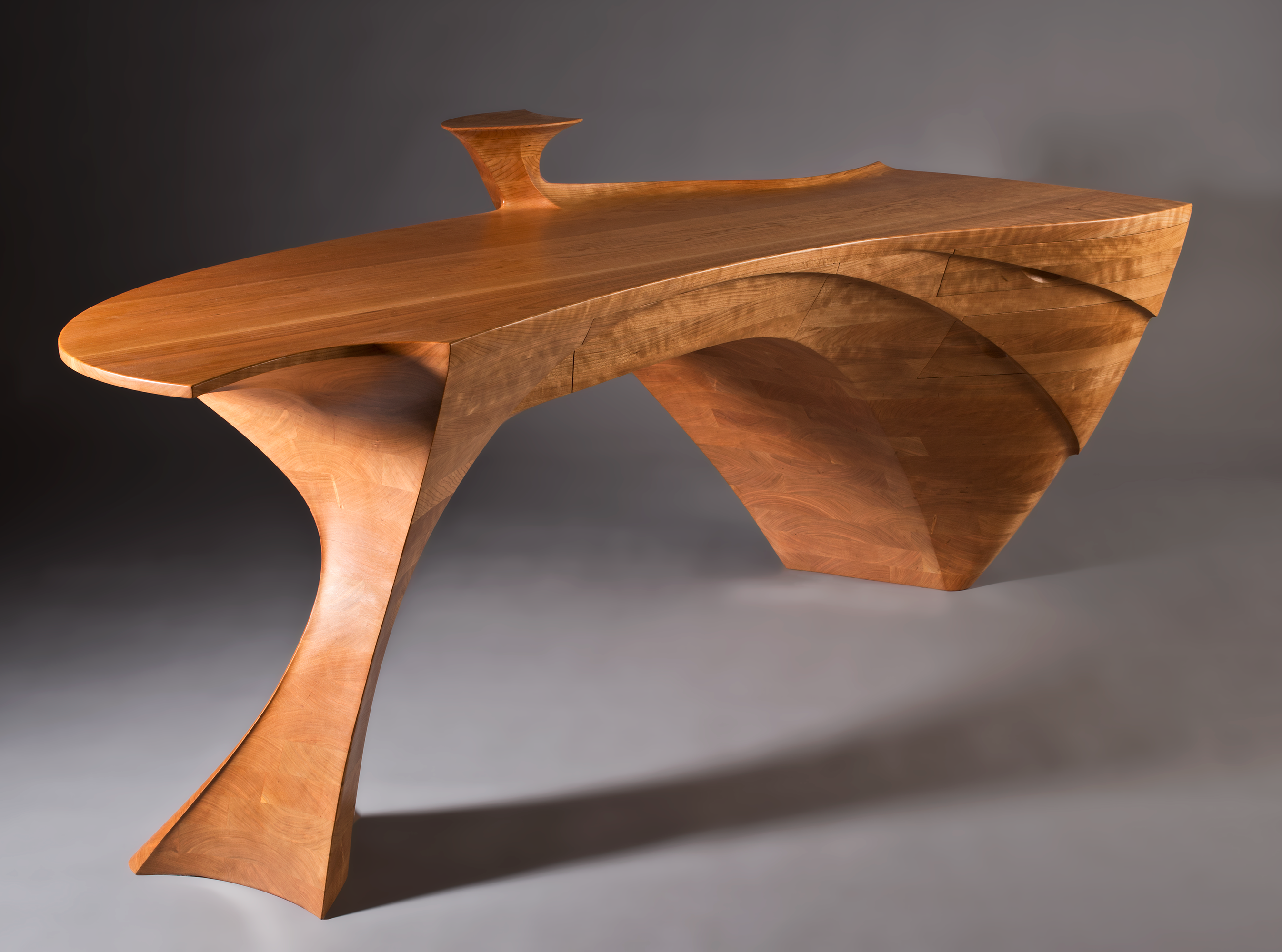 Wave Desk, 2019, sustainably harvested cherry, 36 x 80 x 32 in. Photo by Myron Gauger.