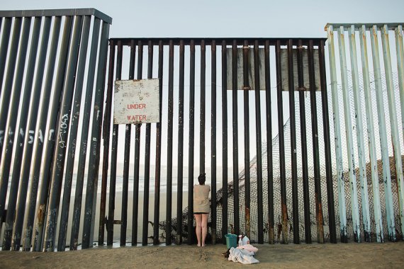 Tanya Aguiniga at border wall