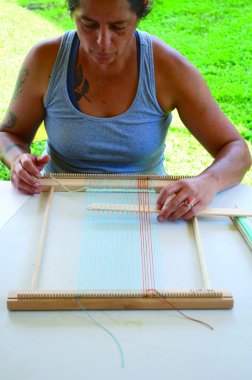 April Stone learns weaving techniques at Maggie Thompsons workshop