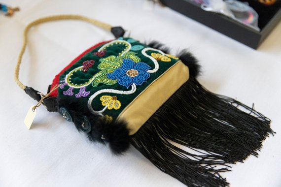 hand crafted beaded bag with tassels