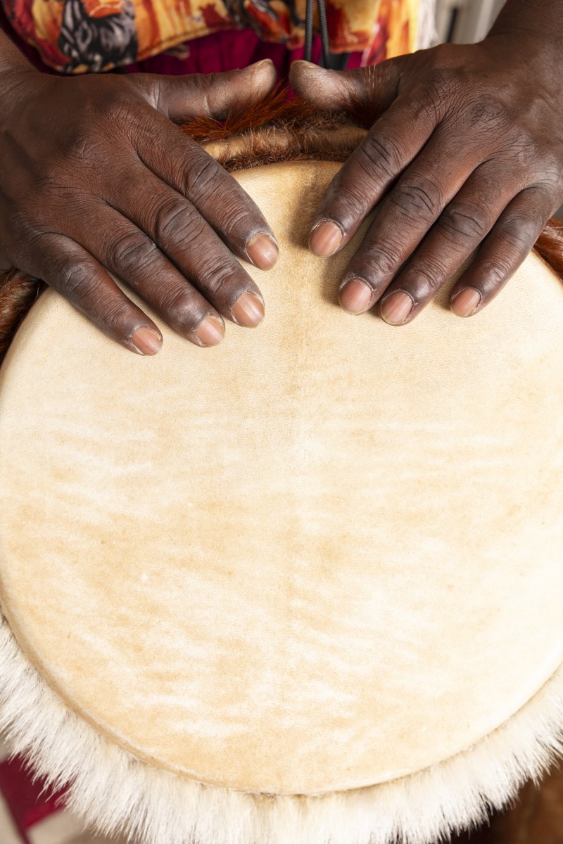 Koné’s hands on a drum. Photo by Cedric Angeles.