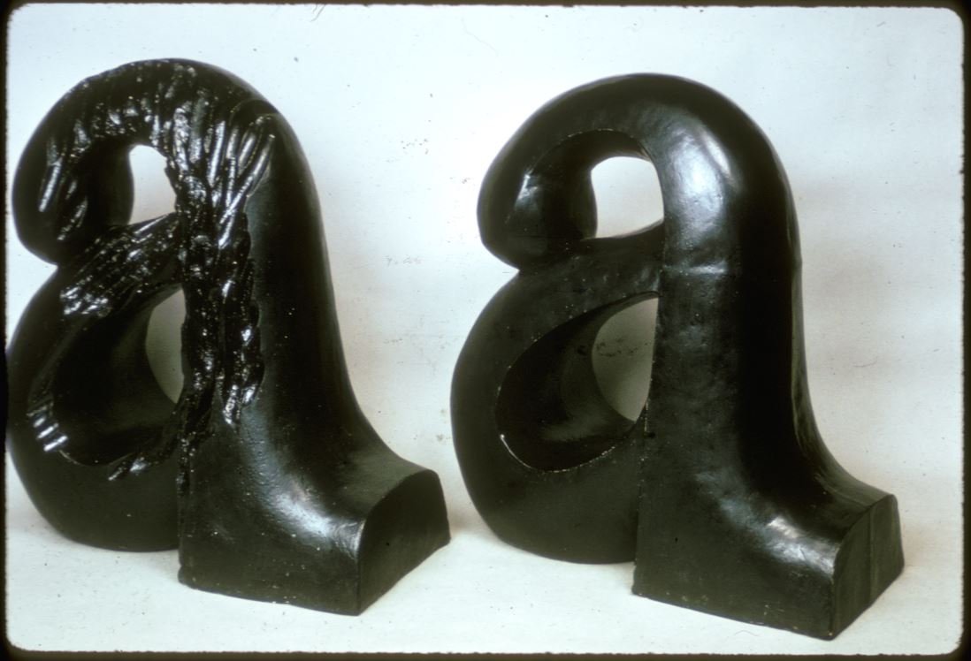 Jim Melchert’s work titled ‘A’ Made 4 Lbs. Lighter (left); Prototype (right), 1969, earthenware, urethane, 21 x 22 inches.