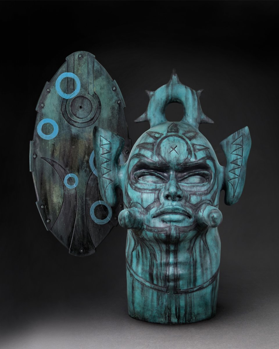 Sculptural ceramic work with head and shield
