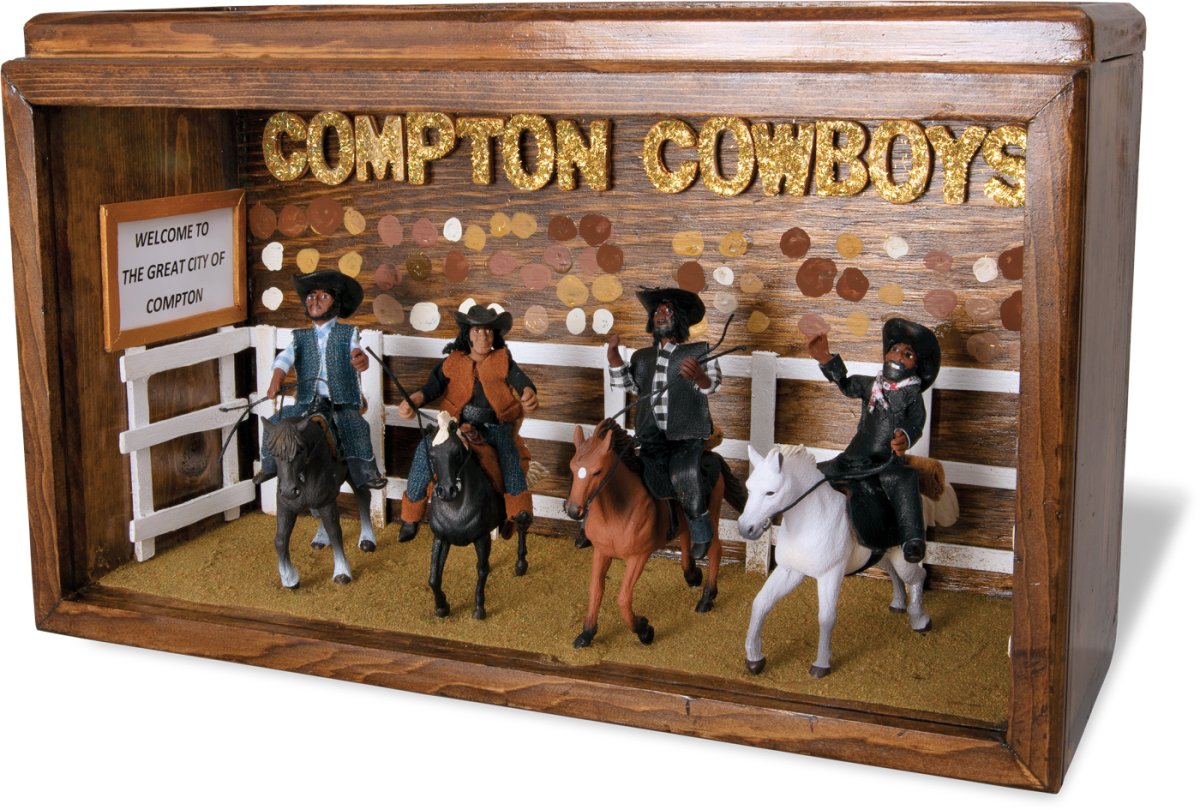 Diorama of Black people riding horses. 