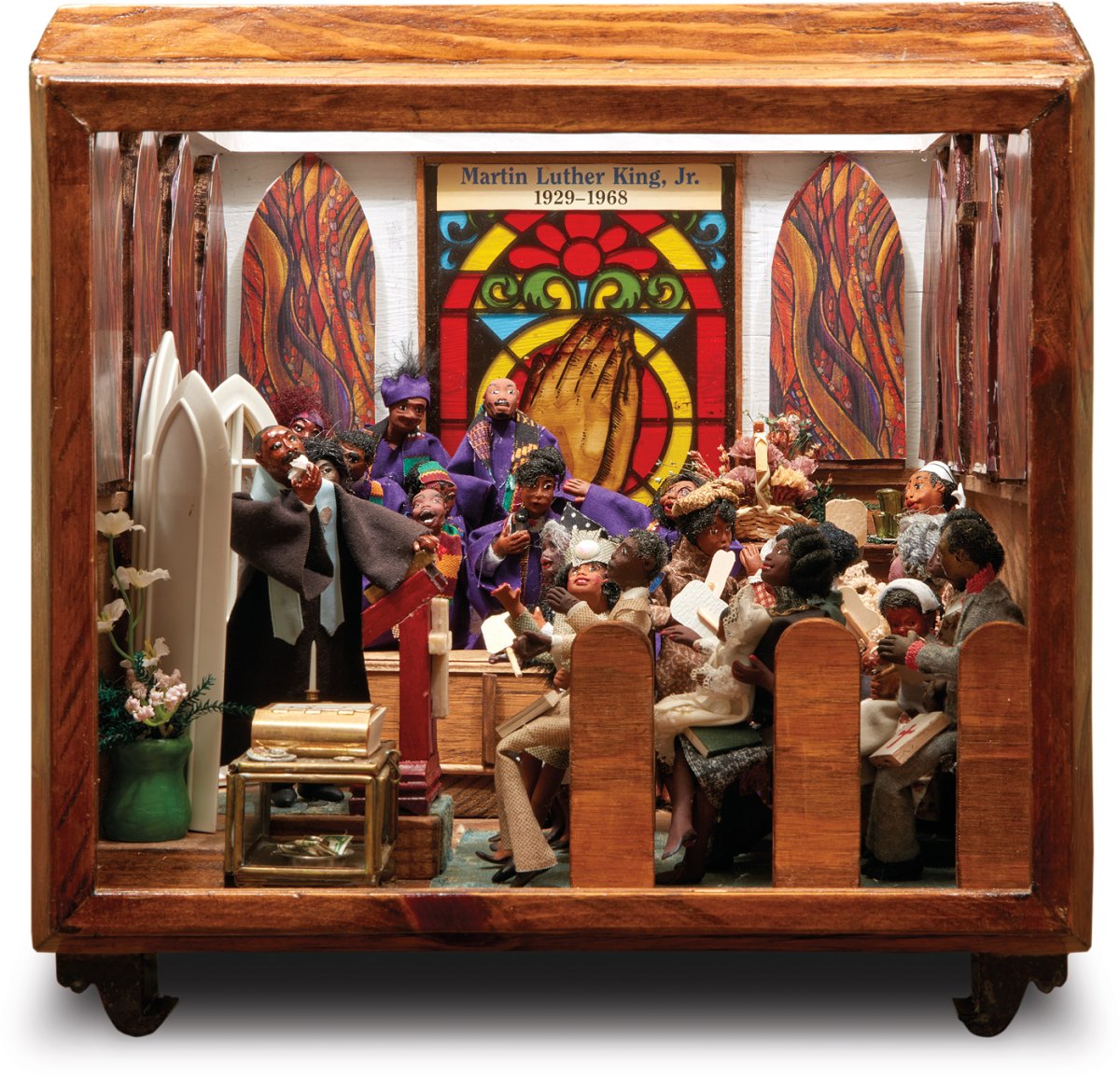 Diorama of Martin Luther King preaching in a church.