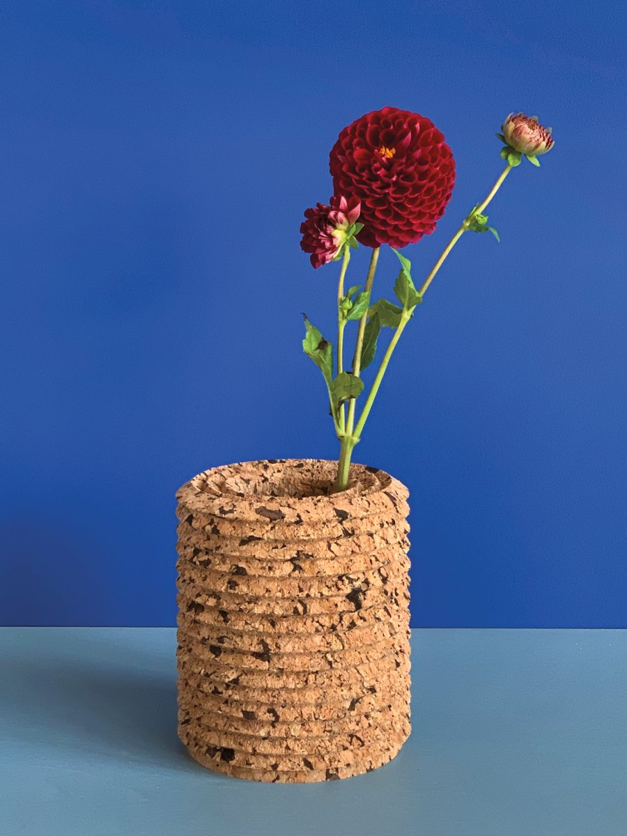 Flower in vase made of cork