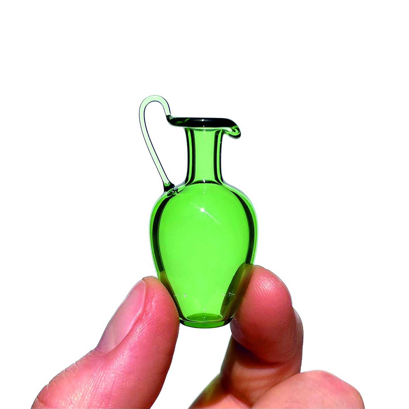 Miniature glass blown pitcher.