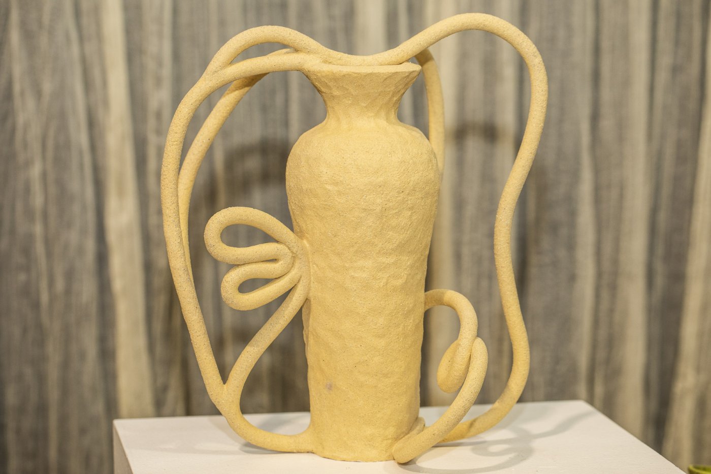 Large ceramic vessel inspired by a baroque candelabra.