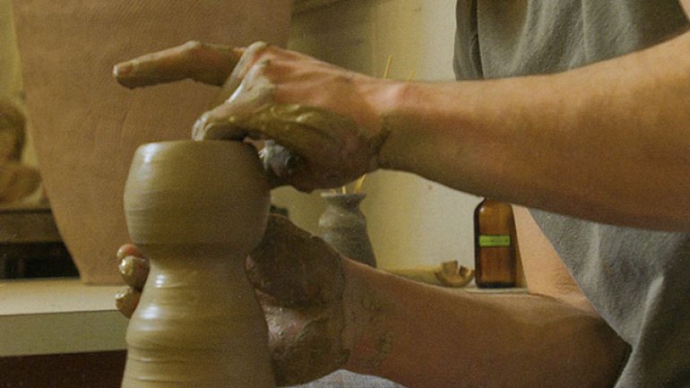 Joel Cherrico throwing pottery