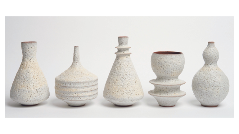 Image of 5 pieces of pottery in various sizes and shapes.