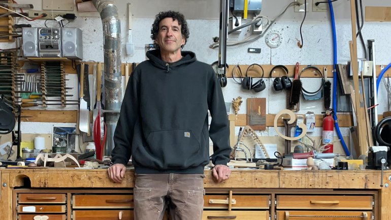 Seth Rolland at his work bench, 2024. Photo by Seth Rolland.