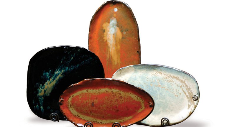 Earthborn Pottery Platters in black, red, and vanilla bean