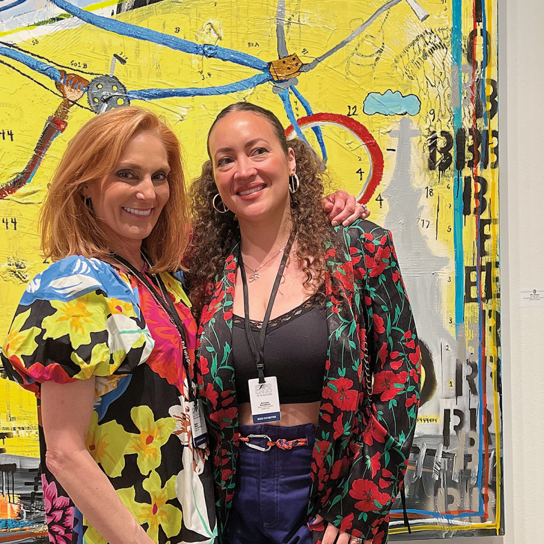 Claire Oliver (left) with artist Simone Elizabeth Saunders, whose Unearthing Unicorns exhibition was held recently at Claire Oliver Gallery. Photo courtesy of Claire Oliver Gallery.
