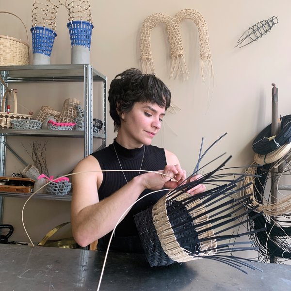 Sarita Westrup weaving a basket