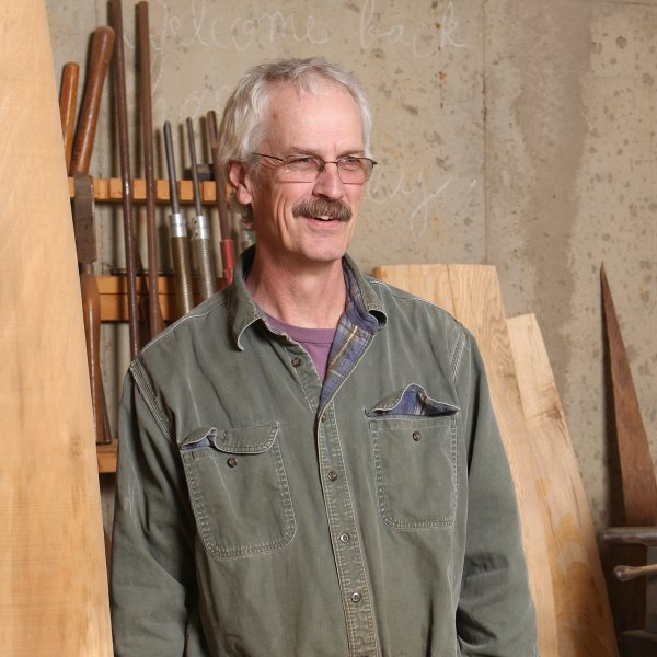 portrait of stoney lamar in wood workshop