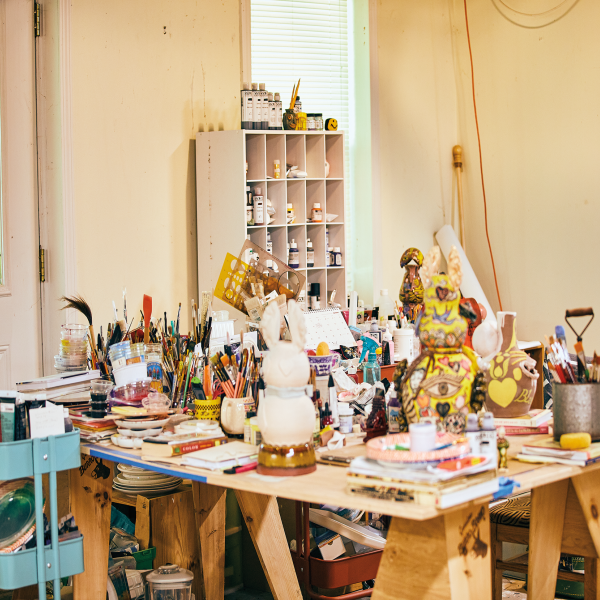 Moon’s work table in her painting studio, where she takes her ceramic sculptures to draw and paint on them with underglaze and glaze.