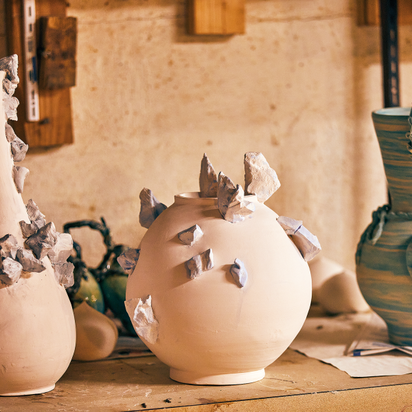 Jiha Moon’s bisque-fired ceramics wait to be drawn on and glazed.