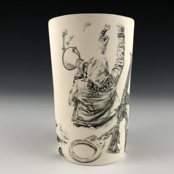 Hand-painted porcelain cup with imagery of protestors and handcuffs.