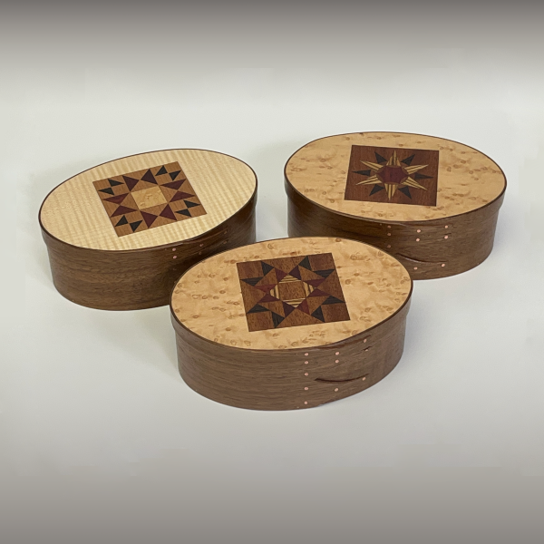 Three quilt-top Shaker boxes by Jeff Neil, each 2.75 x 7.5 x 5 in. Photo courtesy of the artist.