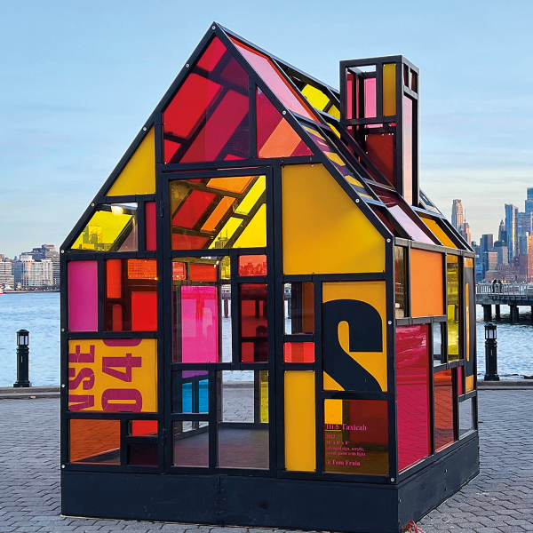 Tom Fruin made Hi 5 Taxi Cab, 2022, from steel and found plexiglass, 10 x 8 x 8 ft. BELOW: Fruin with his Watertower 1. Photo courtesy of Fruin Studio.