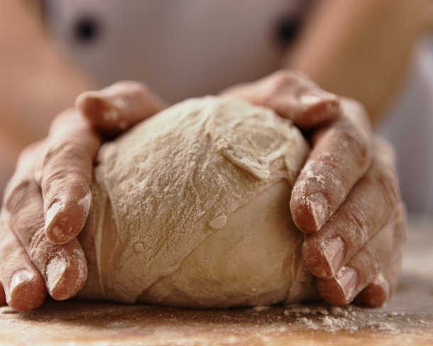Hands Cupping Dough