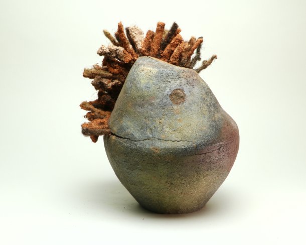 ceramic sculpture made with cemetery soil and human hair
