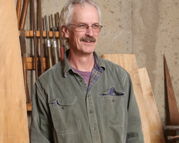 portrait of stoney lamar in wood workshop