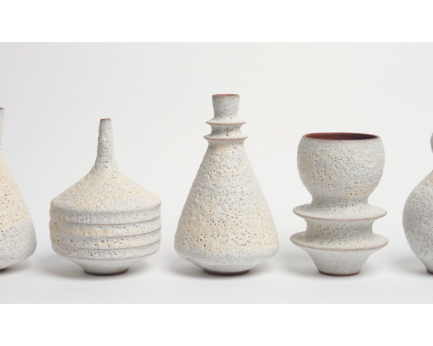 Image of 5 pieces of pottery in various sizes and shapes.