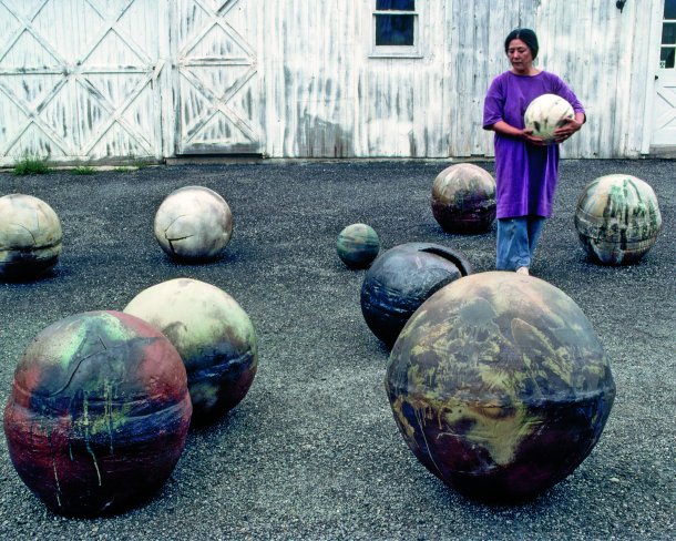 Toshiko Takaezu with her spherical moons in 1979. A new retrospective of her work will appear at the Noguchi Museum and then travel the country. Photo by Hiro. Toshiko Takaezu Archives. © Family of Toshiko Takaezu.