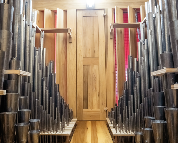 Renowned organ builder Martin Pasi recently expanded the 1961 Hotkamp organ at St. John's Abbey to include 6,000 pipes. Photos by Caroline Yang.